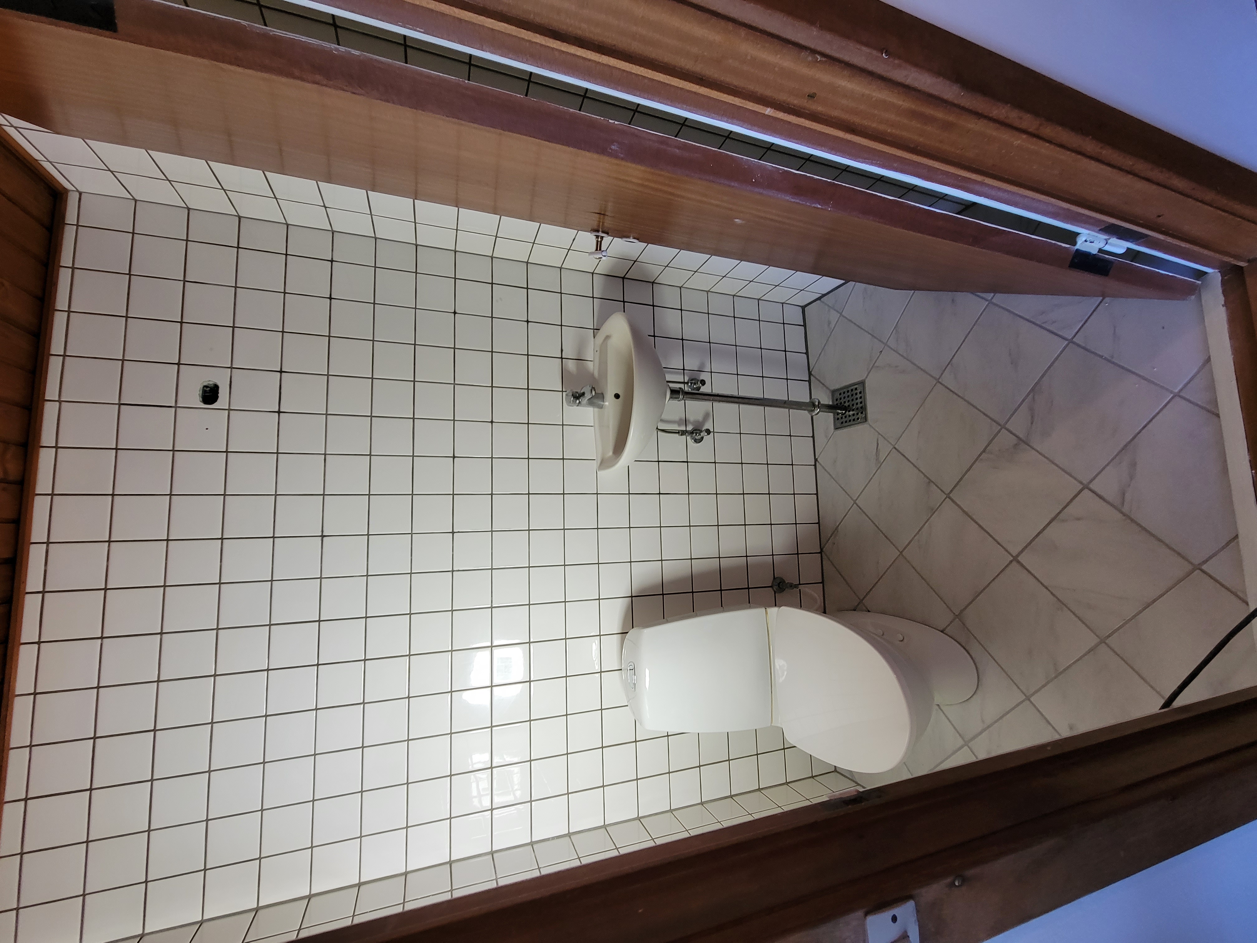 Grout restoration and tub refinish by Heritage Coatings